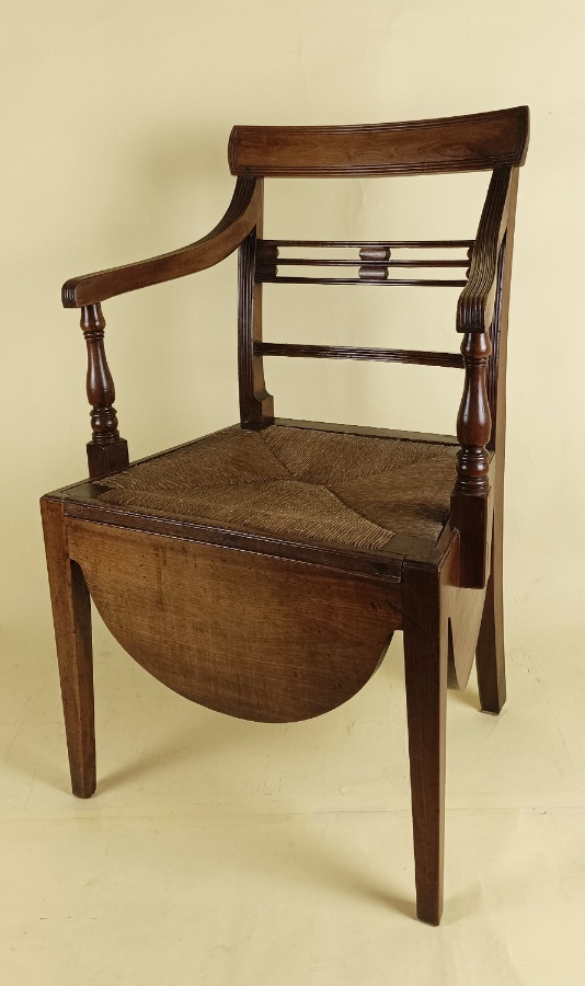 Regency mahogany commode elbow open armchair